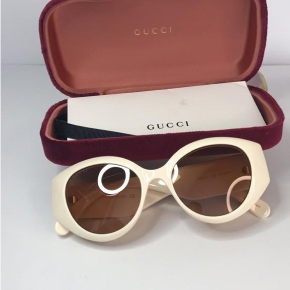 GUCCI GG0809S 002 cat eye sunglass comes in a ivory frame with brown lenses. - Picture 13 of 15